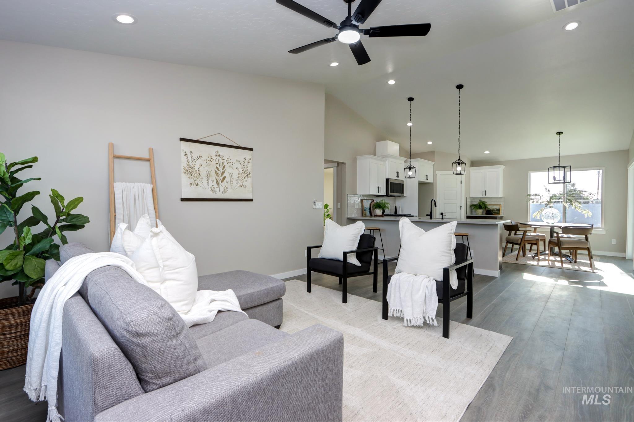 848 North 5th Street Nyssa, OR 97913 - Photo 9 of 49 Open-concept living space featuring wood-finish flooring, recessed lighting, and a ceiling fan