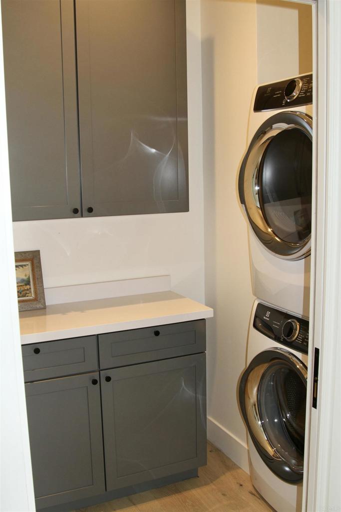 6173 Paseo Arbolado Rancho Santa Fe, CA 92067 - Photo 15 of 16 a utility room with dryer and washer