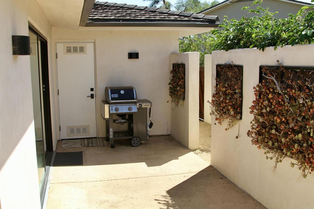 6173 Paseo Arbolado Rancho Santa Fe, CA 92067 - Photo 9 of 16 a view of kitchen with furniture and a refrigerator