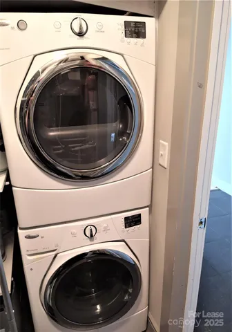 a view of a room with table and chair
