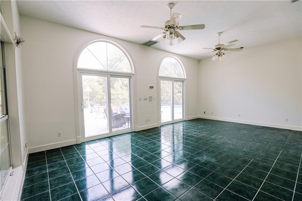 7404 Golfers Villa Rica, GA 30180 - Photo 31 of 43 wooden floor in an empty room with a window