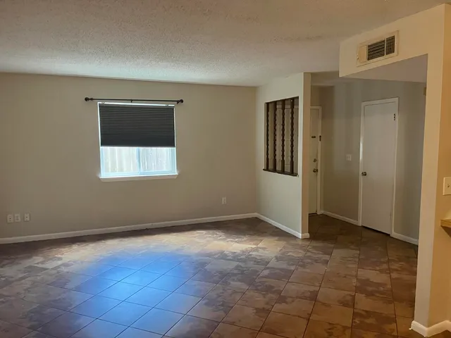 a view of an empty room with window