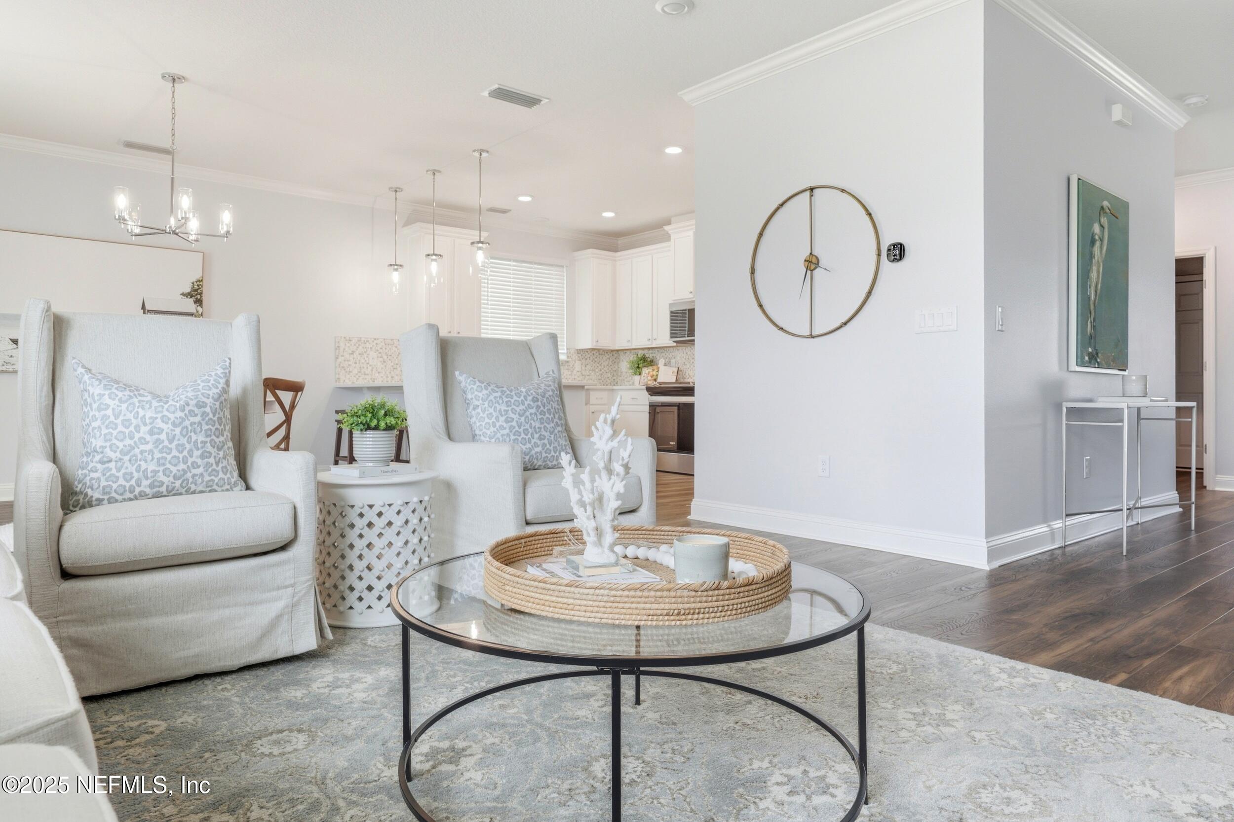 251 Rambling Brk Trail St. Johns, FL 32259 - Photo 11 of 40 a living room with furniture a mirror and a table