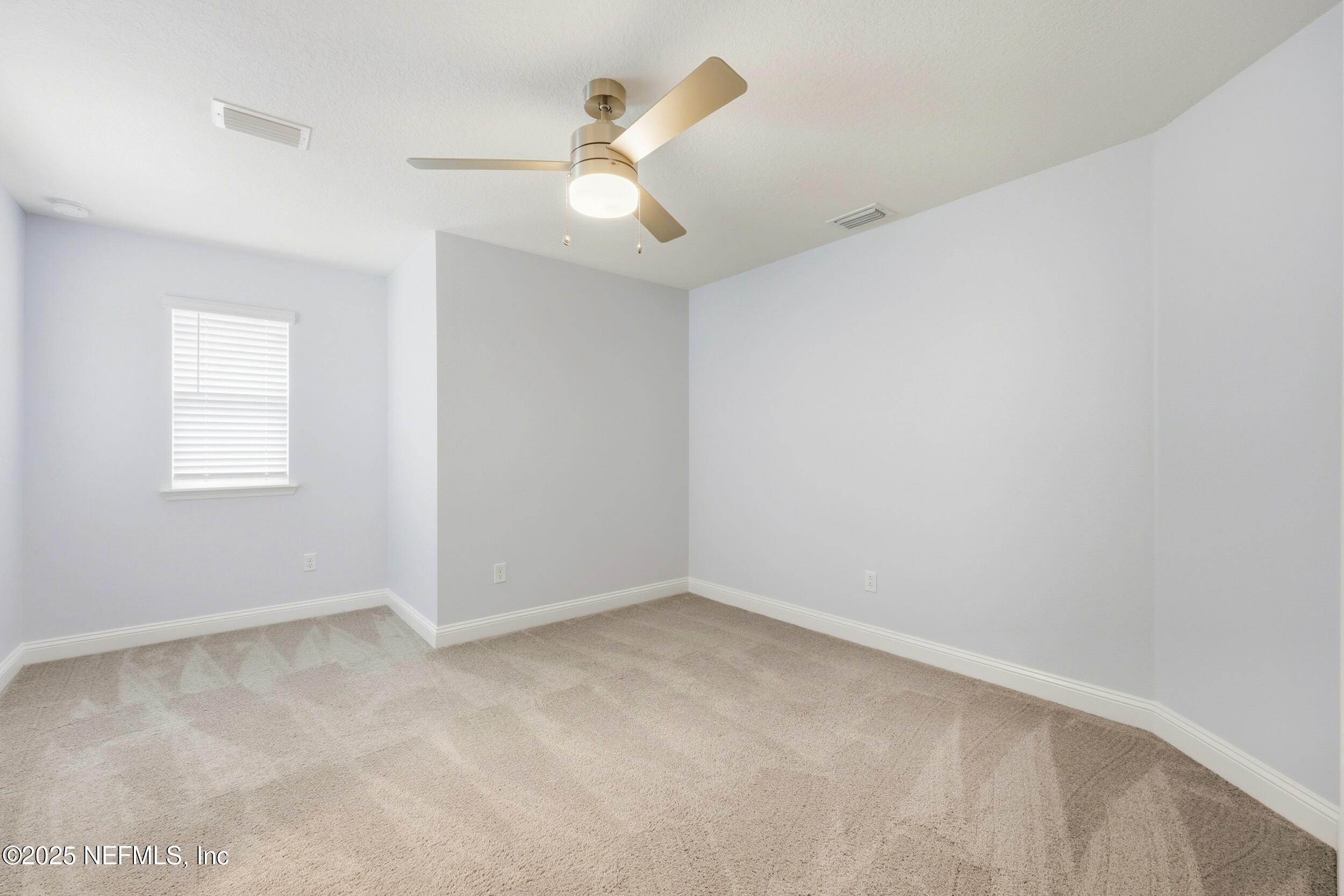 251 Rambling Brk Trail St. Johns, FL 32259 - Photo 30 of 40 an empty room with a window