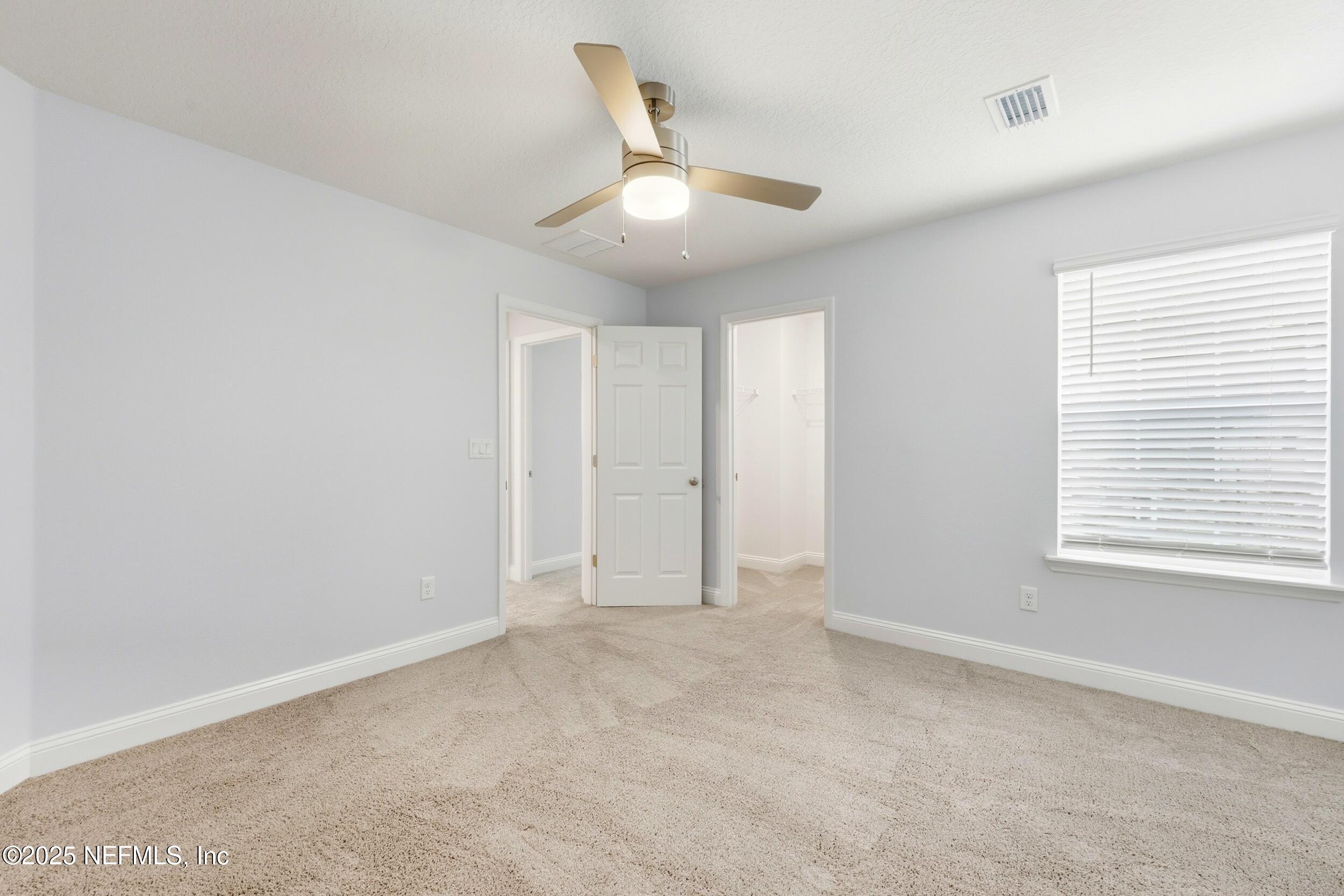 251 Rambling Brk Trail St. Johns, FL 32259 - Photo 31 of 40 a view of an empty room with a window
