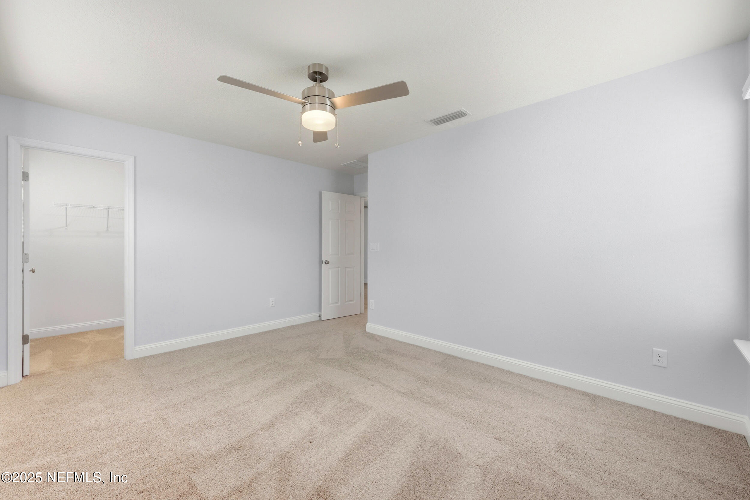 251 Rambling Brk Trail St. Johns, FL 32259 - Photo 33 of 40 an empty room with a fan & a ceiling fan