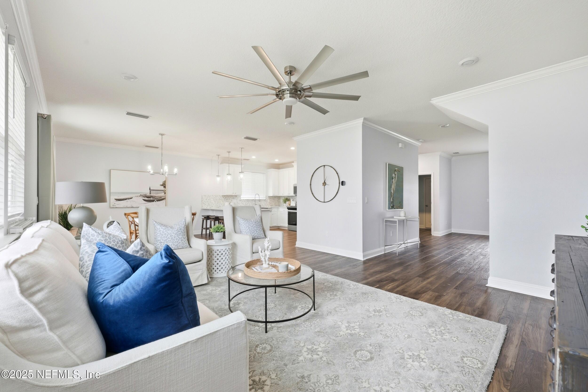 251 Rambling Brk Trail St. Johns, FL 32259 - Photo 8 of 40 a living room with furniture and a table