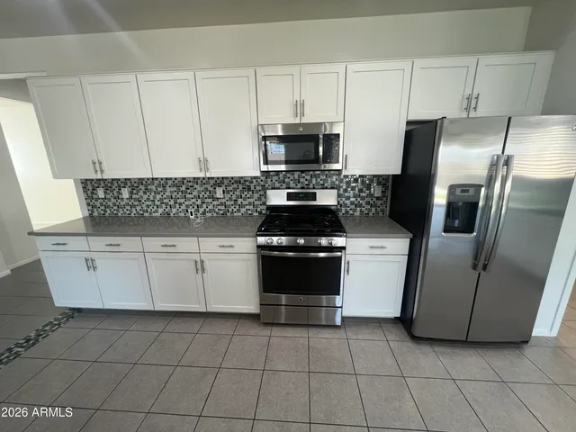 a view of kitchen with furniture