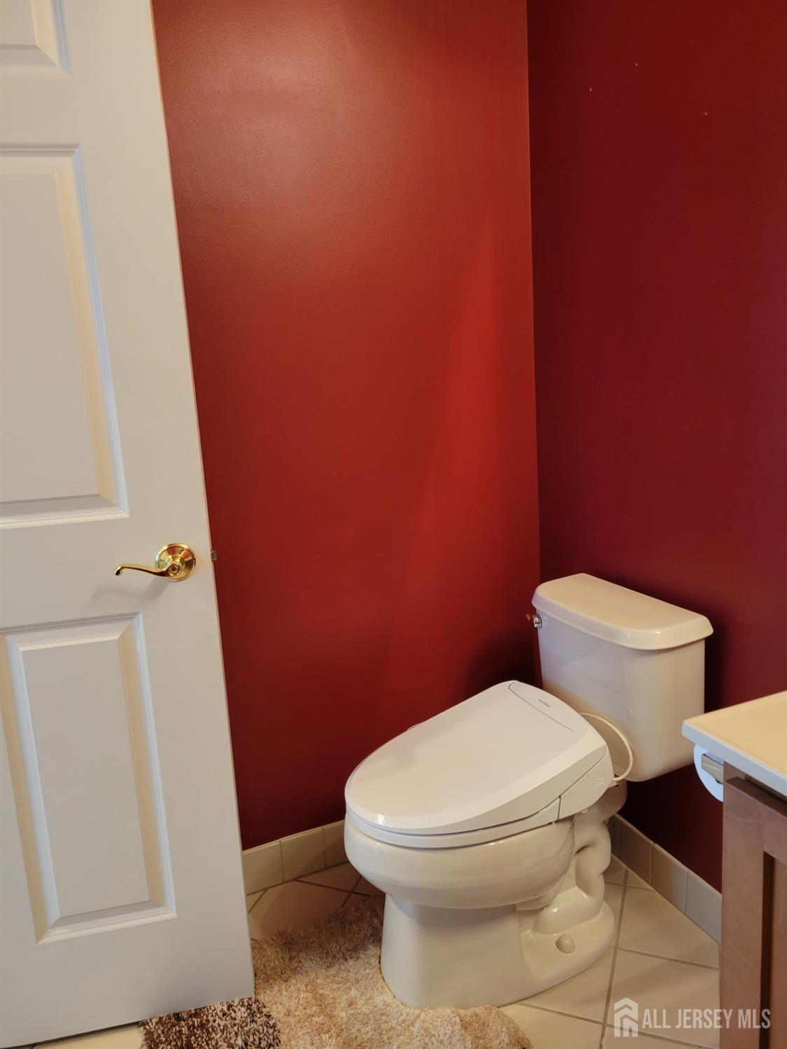 100 Middlesex Boulevard, Unit 341 Plainsboro, NJ 08536 - Photo 10 of 16 a white toilet sitting next to a sink
