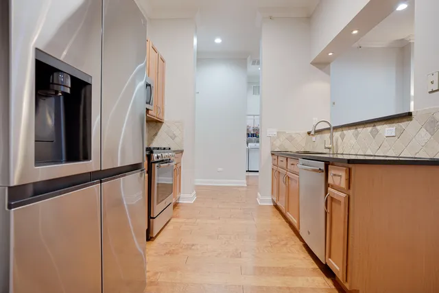a view of a kitchen cabinets and a stove
