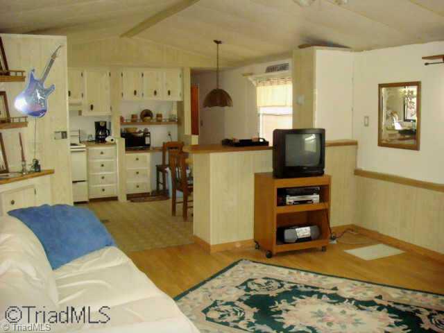588 Estes Road Reidsville, NC 27320 - Photo 5 of 9 Other. Eat-in Kitchen and Living area with new laminate floors