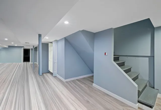 a view of a hallway with staircase