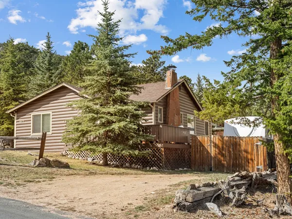 a view of a house with a garage