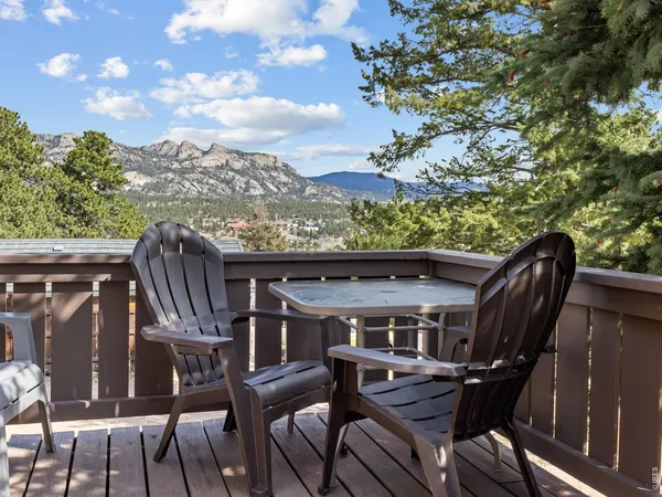 a view of a patio with furniture