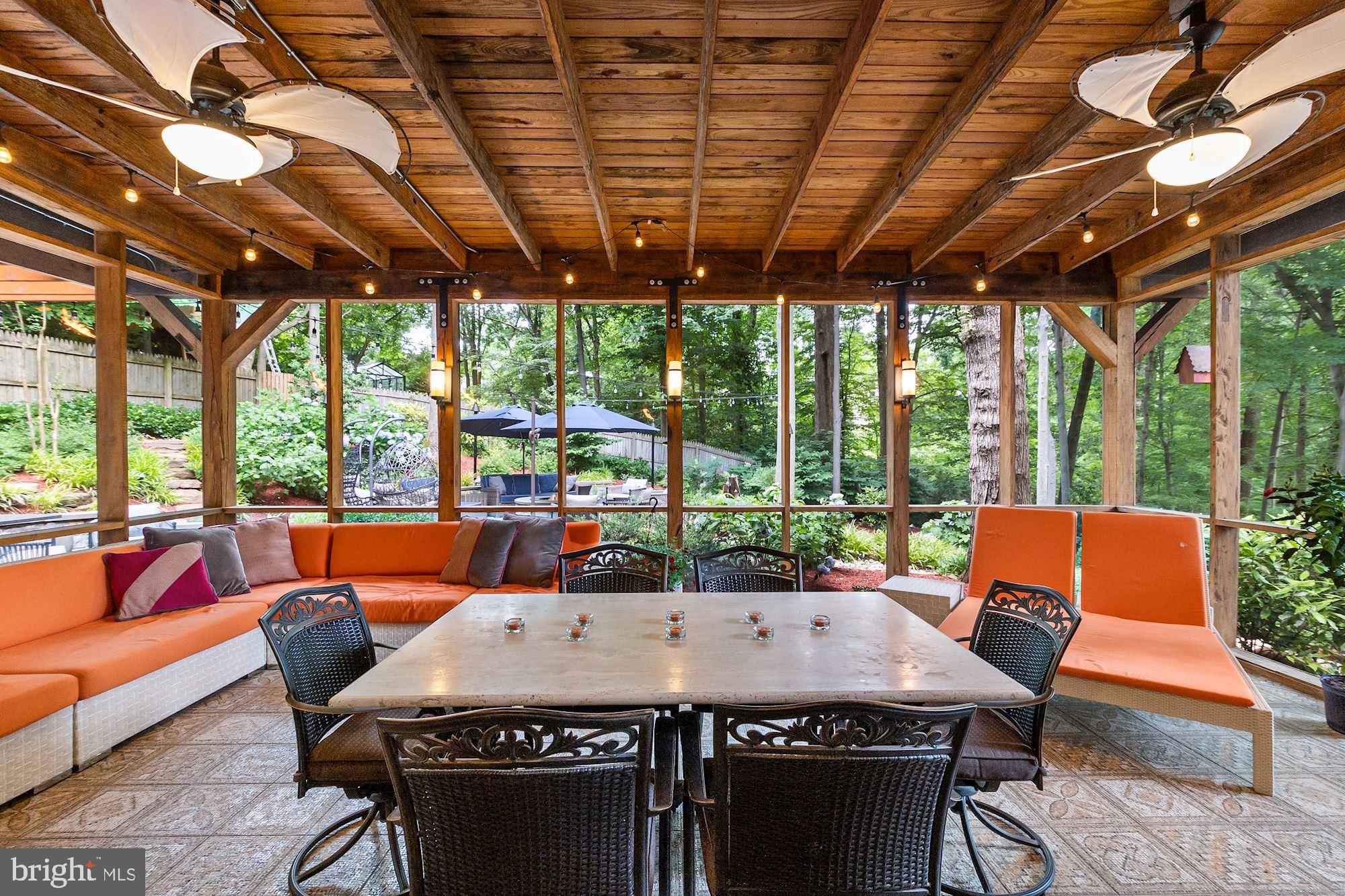 7400 Nevis Road Bethesda, MD 20817 - Photo 18 of 47 a view of an outdoor dining space with furniture