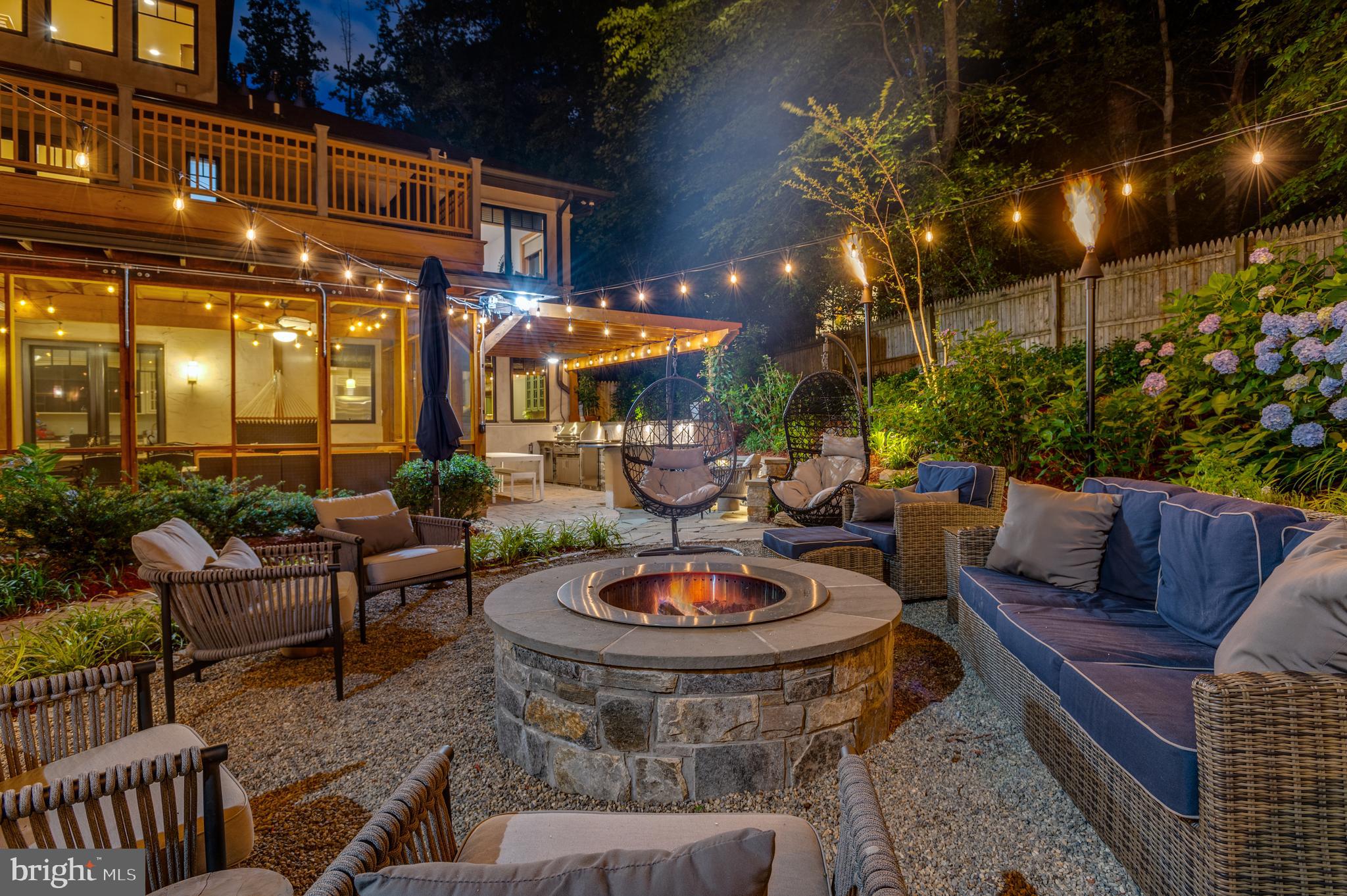 7400 Nevis Road Bethesda, MD 20817 - Photo 3 of 47 a view of a patio with couches table and chairs and potted plants