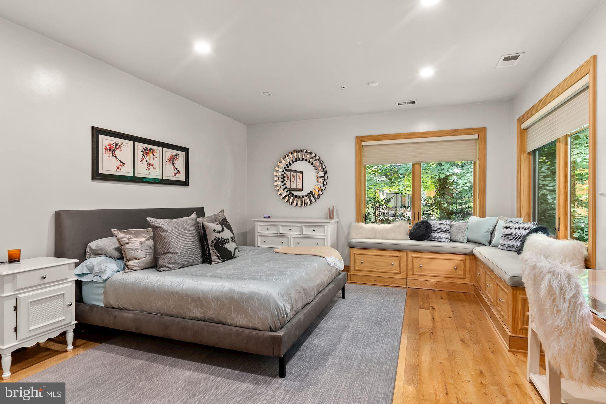 7400 Nevis Road Bethesda, MD 20817 - Photo 35 of 47 a bed room with a bed and a large window