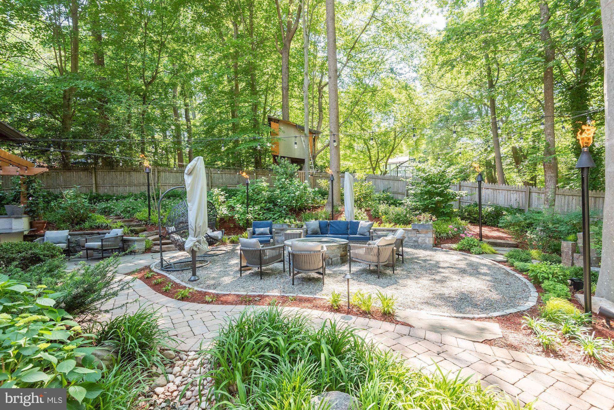 7400 Nevis Road Bethesda, MD 20817 - Photo 44 of 47 a view of backyard with swimming pool and outdoor seating