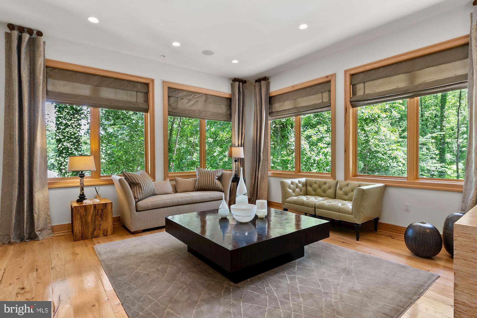 7400 Nevis Road Bethesda, MD 20817 - Photo 9 of 47 a living room with furniture and a large window