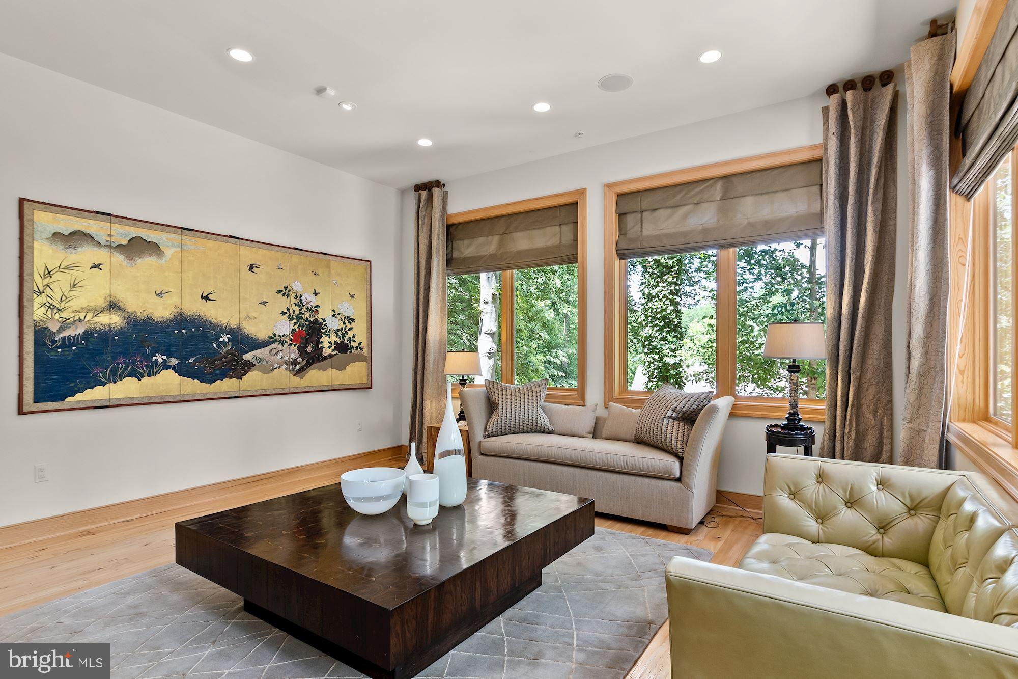 7400 Nevis Road Bethesda, MD 20817 - Photo 10 of 47 a living room with furniture and a large window