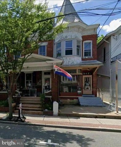 a view of a house with a porch