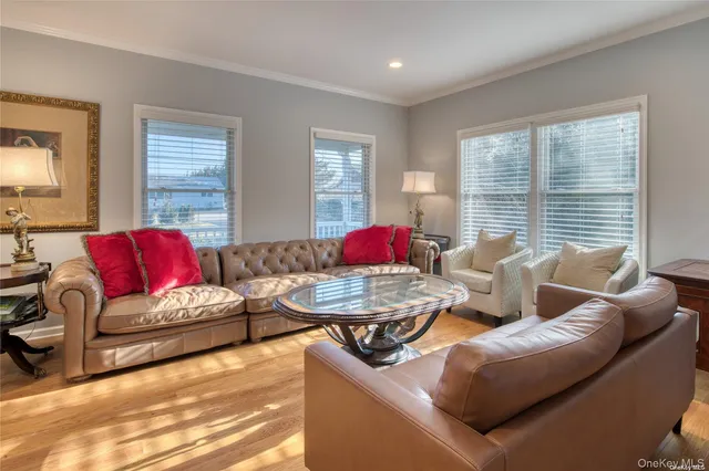a living room with furniture and window