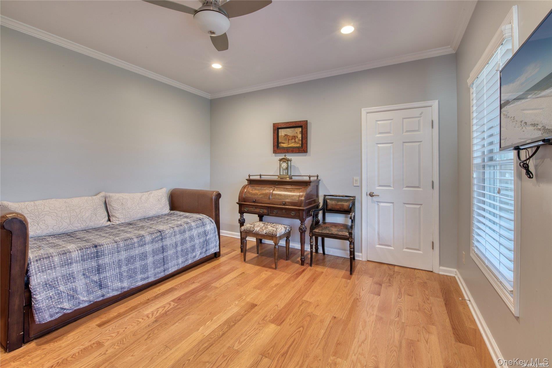 750 Kerwin Boulevard Greenport, NY 11944 - Photo 7 of 21 a living room with furniture and a wooden floor