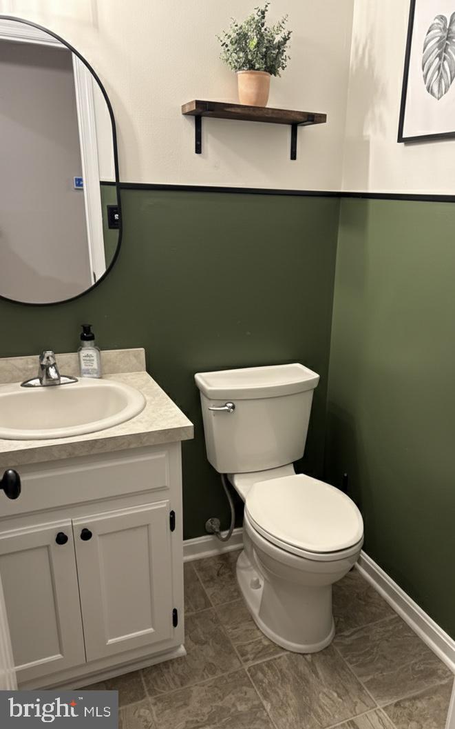 11946 Ropp Lane Lovettsville, VA 20180 - Photo 12 of 48 a bathroom with a toilet sink and mirror