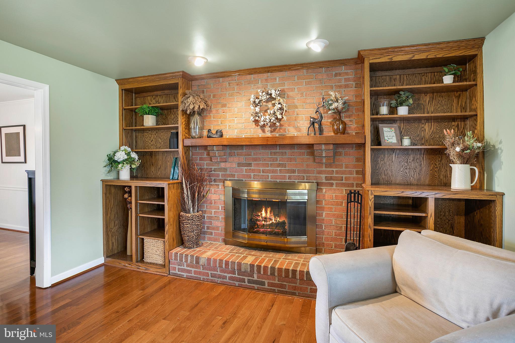 11946 Ropp Lane Lovettsville, VA 20180 - Photo 3 of 48 a living room with furniture and a fireplace