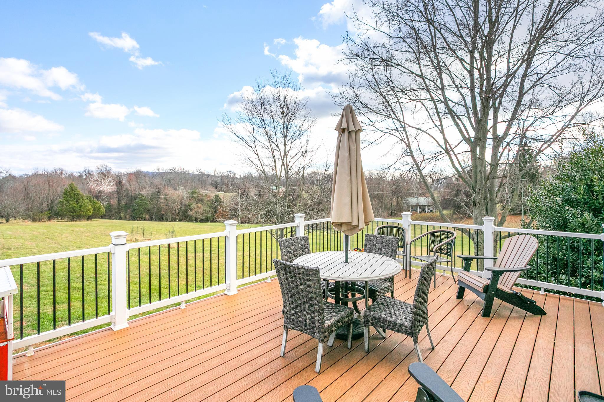 11946 Ropp Lane Lovettsville, VA 20180 - Photo 31 of 48 a view of balcony with furniture and wooden floor