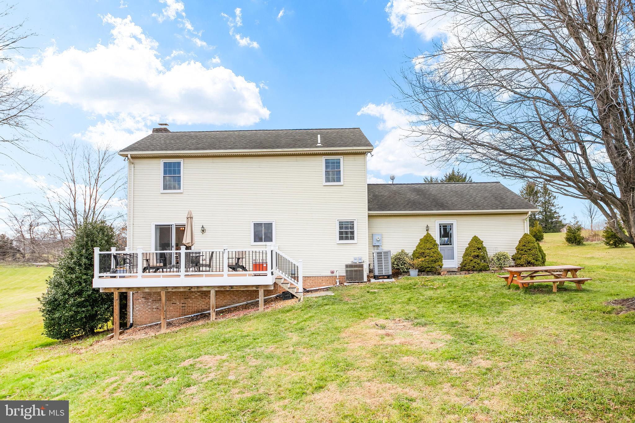 11946 Ropp Lane Lovettsville, VA 20180 - Photo 33 of 48 a view of a house with backyard porch and sitting area
