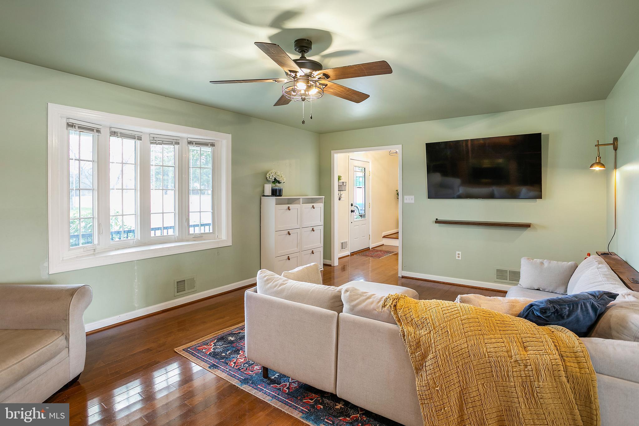 11946 Ropp Lane Lovettsville, VA 20180 - Photo 4 of 48 a living room with furniture and a flat screen tv