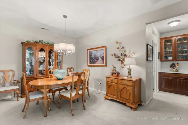 a view of a dining room with furniture