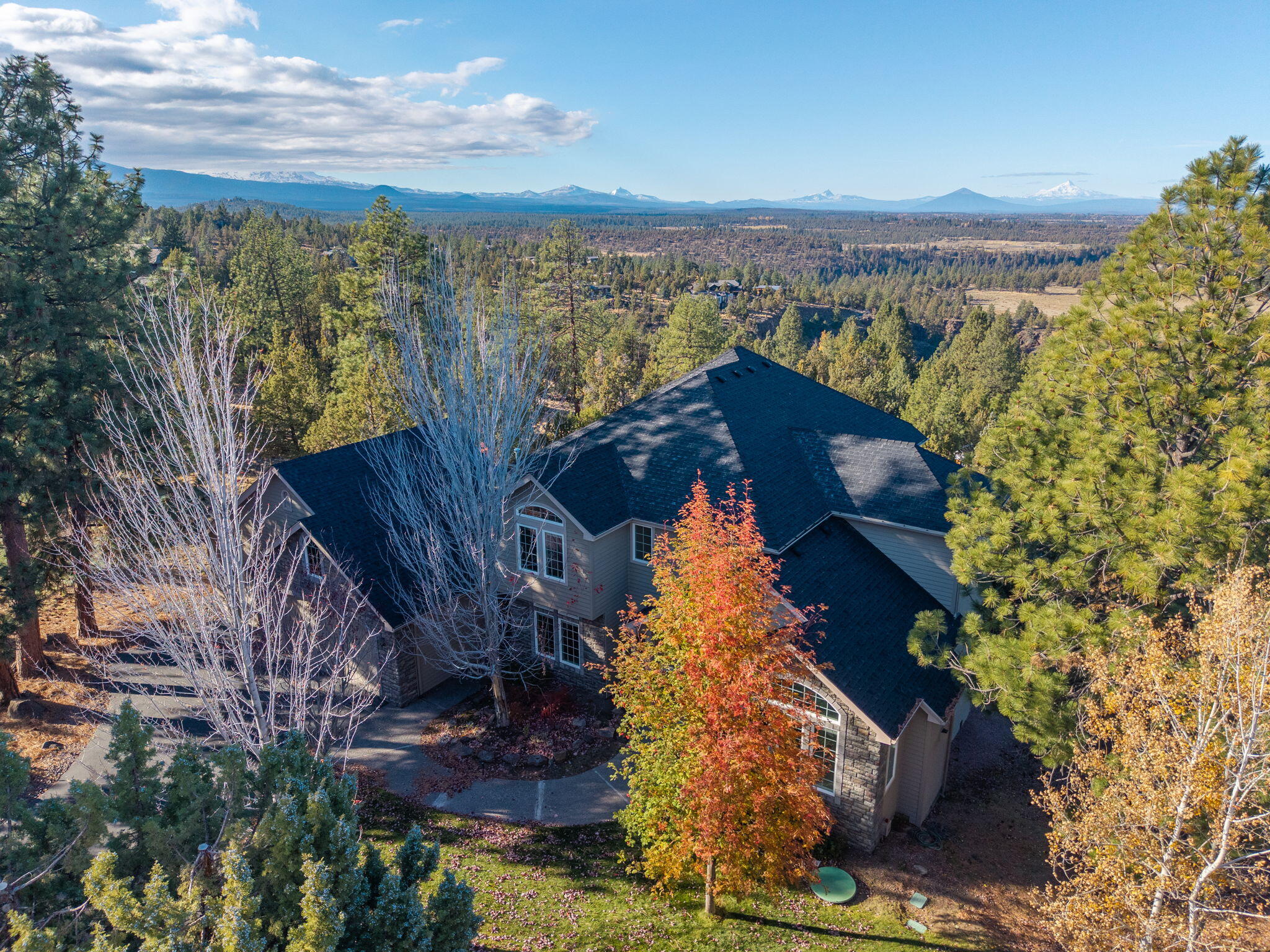 3615 Northwest Falcon Ridge Bend, OR 97703 - Photo 56 of 67 Front of Home w/3 Car Garage