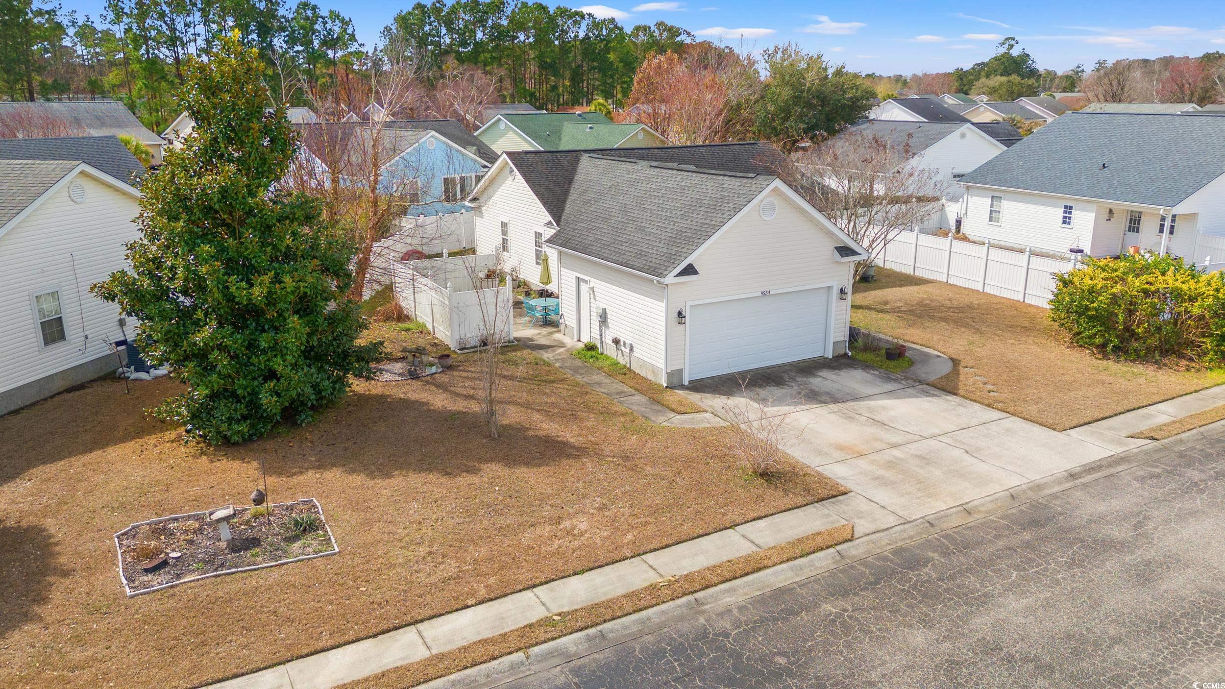 9554 Sullivan Drive Murrells Inlet, SC 29576 - Photo 30 of 35 Drone / aerial view with a residential view