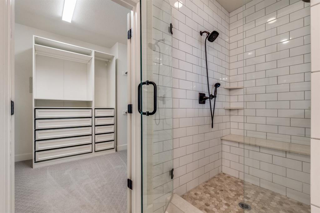 8202 Laflin Lane Dallas, TX 75231 - Photo 21 of 22 a bathroom with a shower