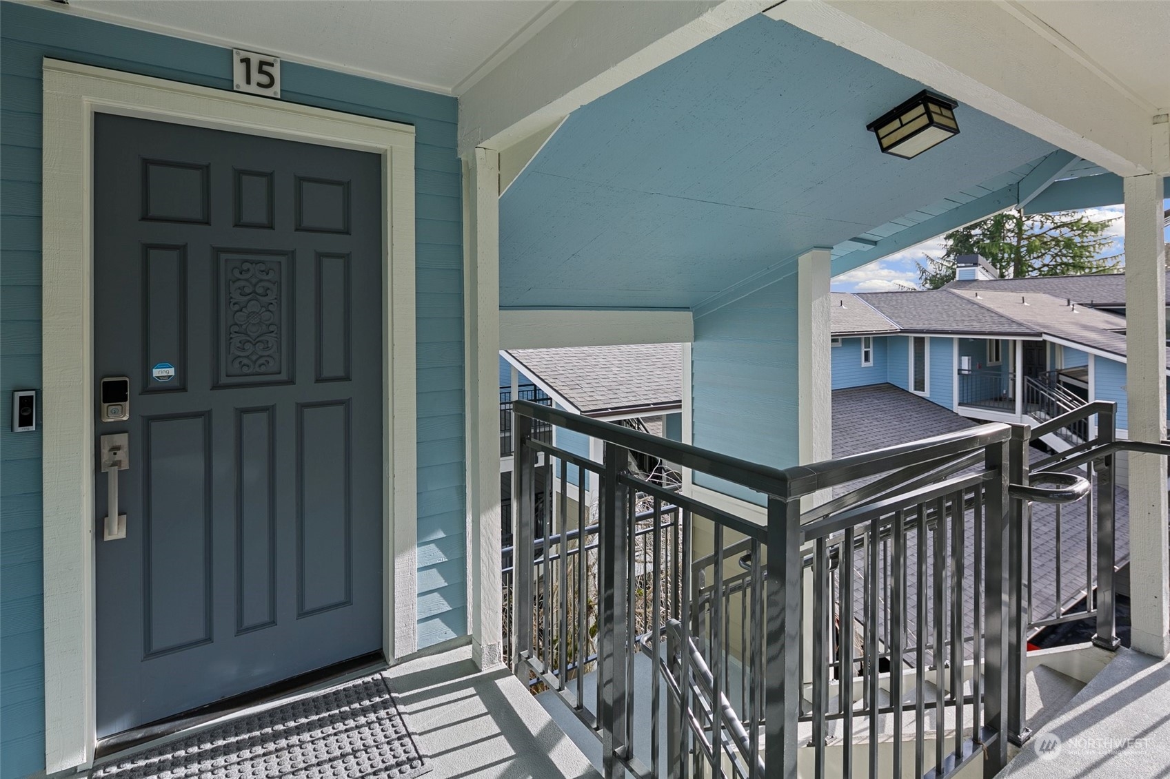7579 Old Redmond Road, Unit 15 Redmond, WA 98052 - Photo 23 of 28 a view of entryway and hall with wooden floor