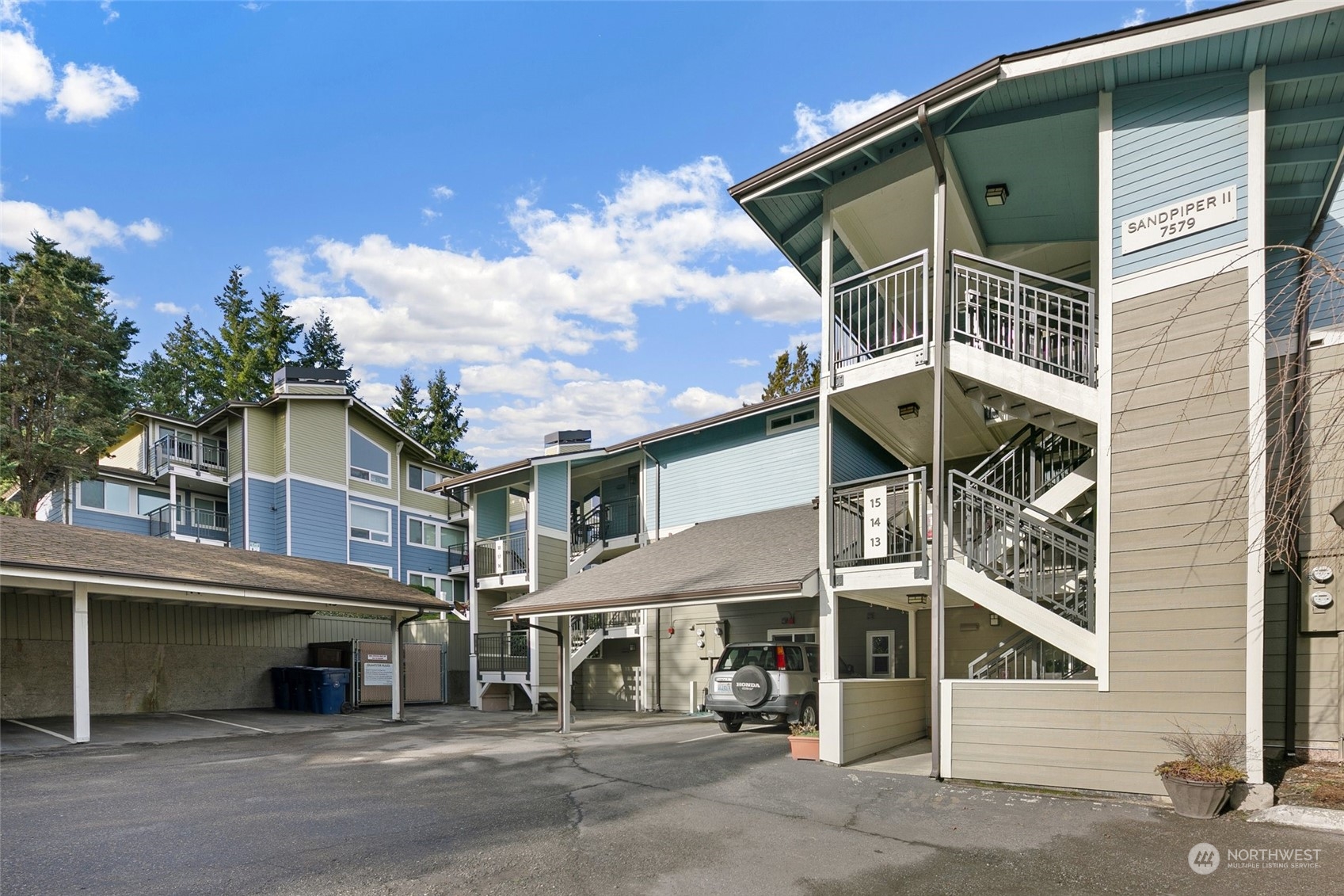 7579 Old Redmond Road, Unit 15 Redmond, WA 98052 - Photo 26 of 28 a front view of a house with a parking space