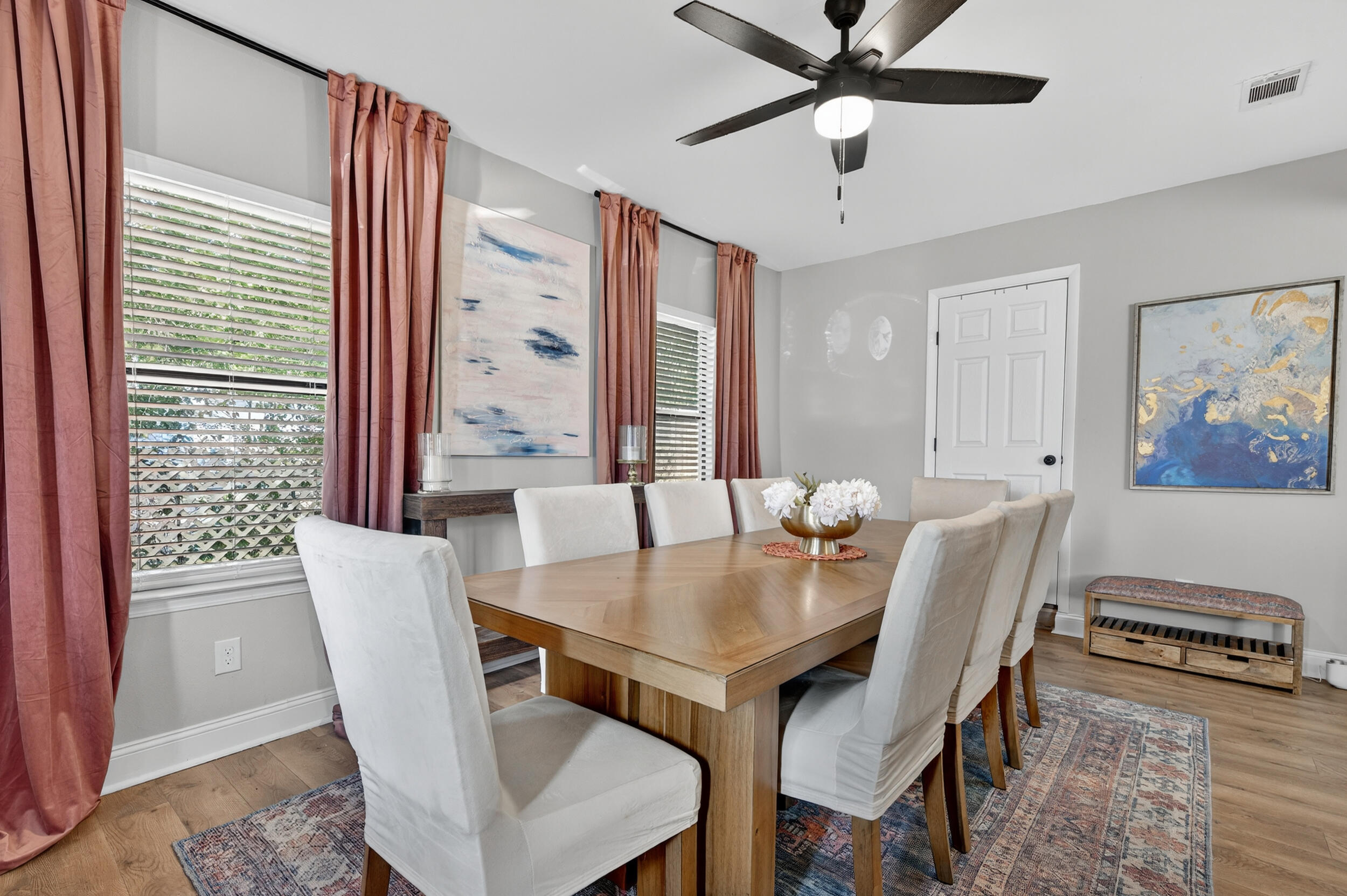 370 Edge Avenue Valparaiso, FL 32580 - Photo 18 of 58 a view of a dining room with furniture window and wooden floor
