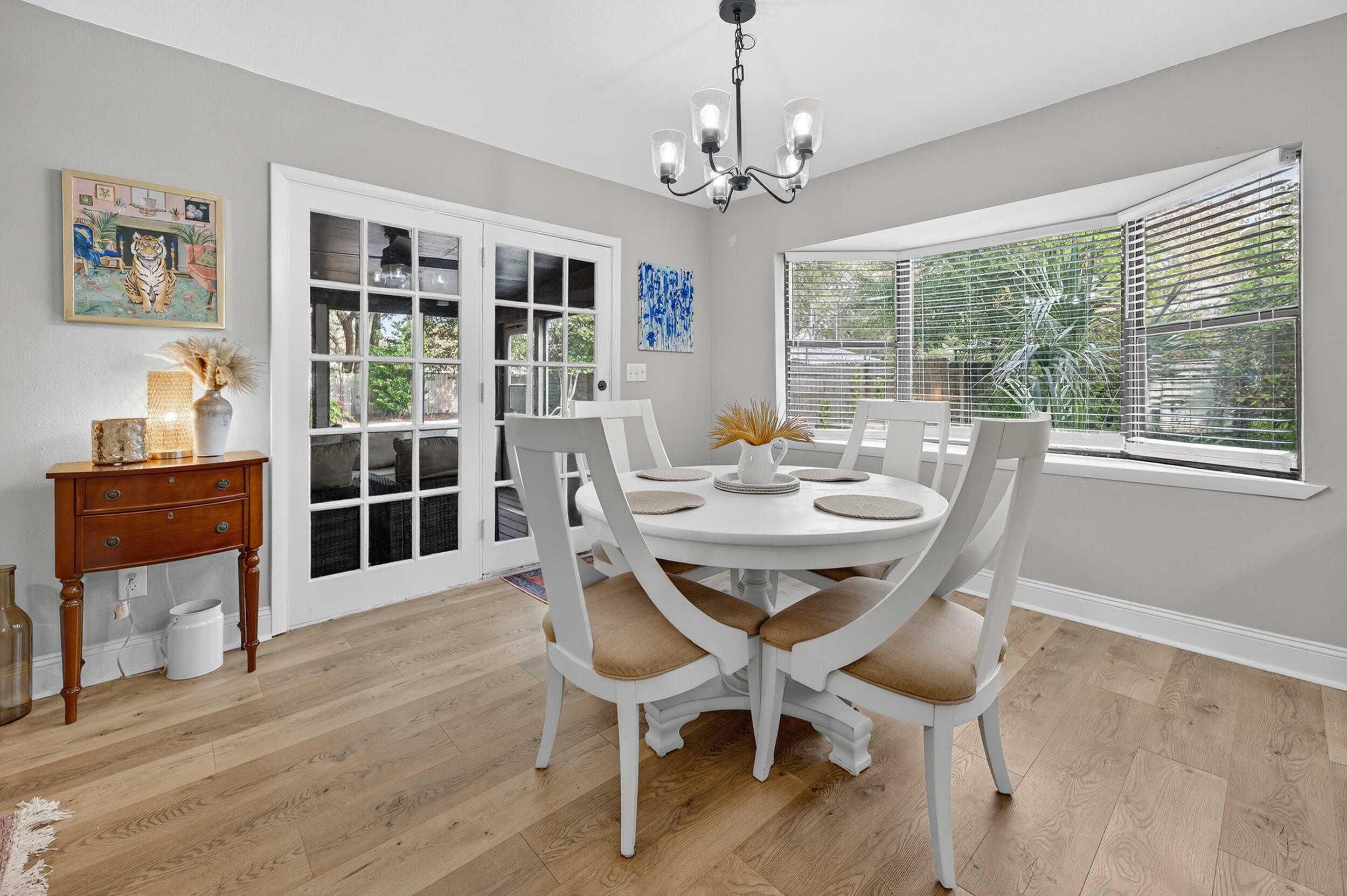 370 Edge Avenue Valparaiso, FL 32580 - Photo 22 of 58 a view of a dining room with furniture window and wooden floor