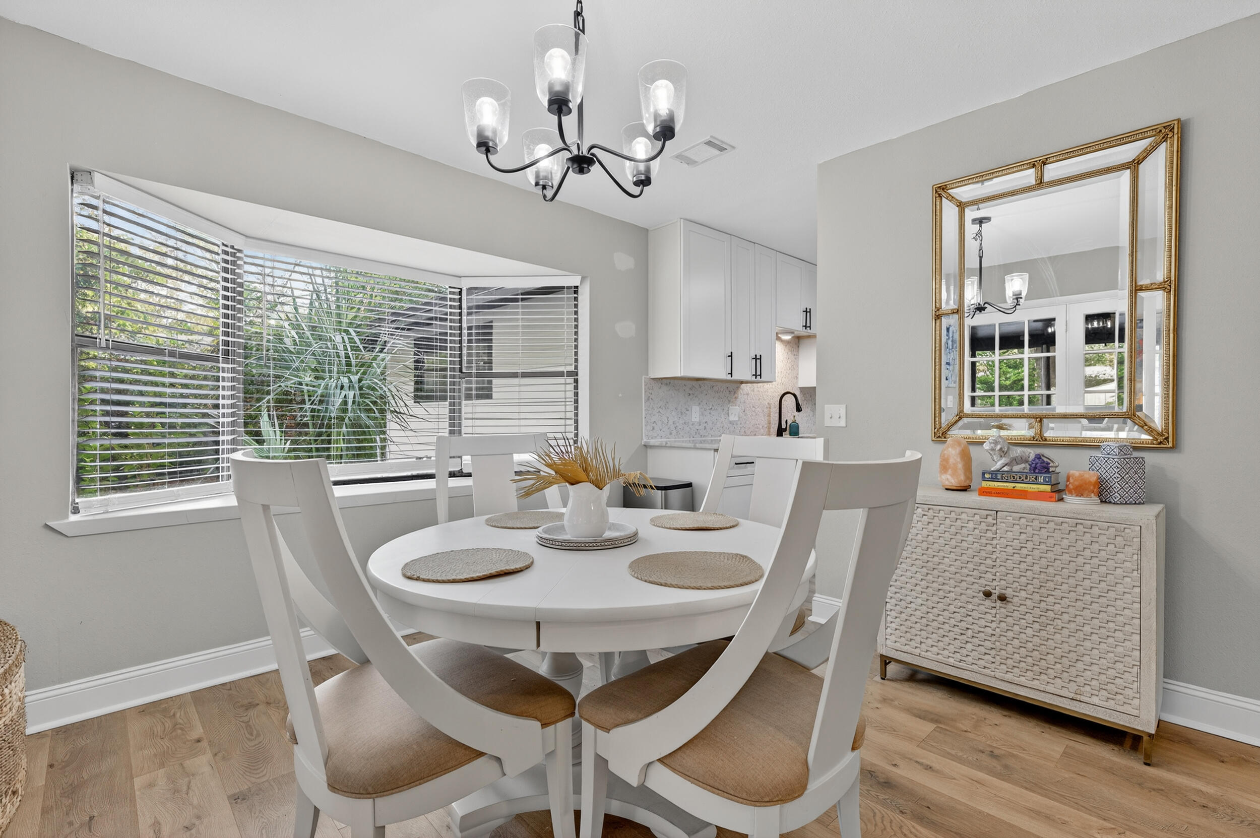 370 Edge Avenue Valparaiso, FL 32580 - Photo 23 of 58 a view of a dining room with furniture window and wooden floor