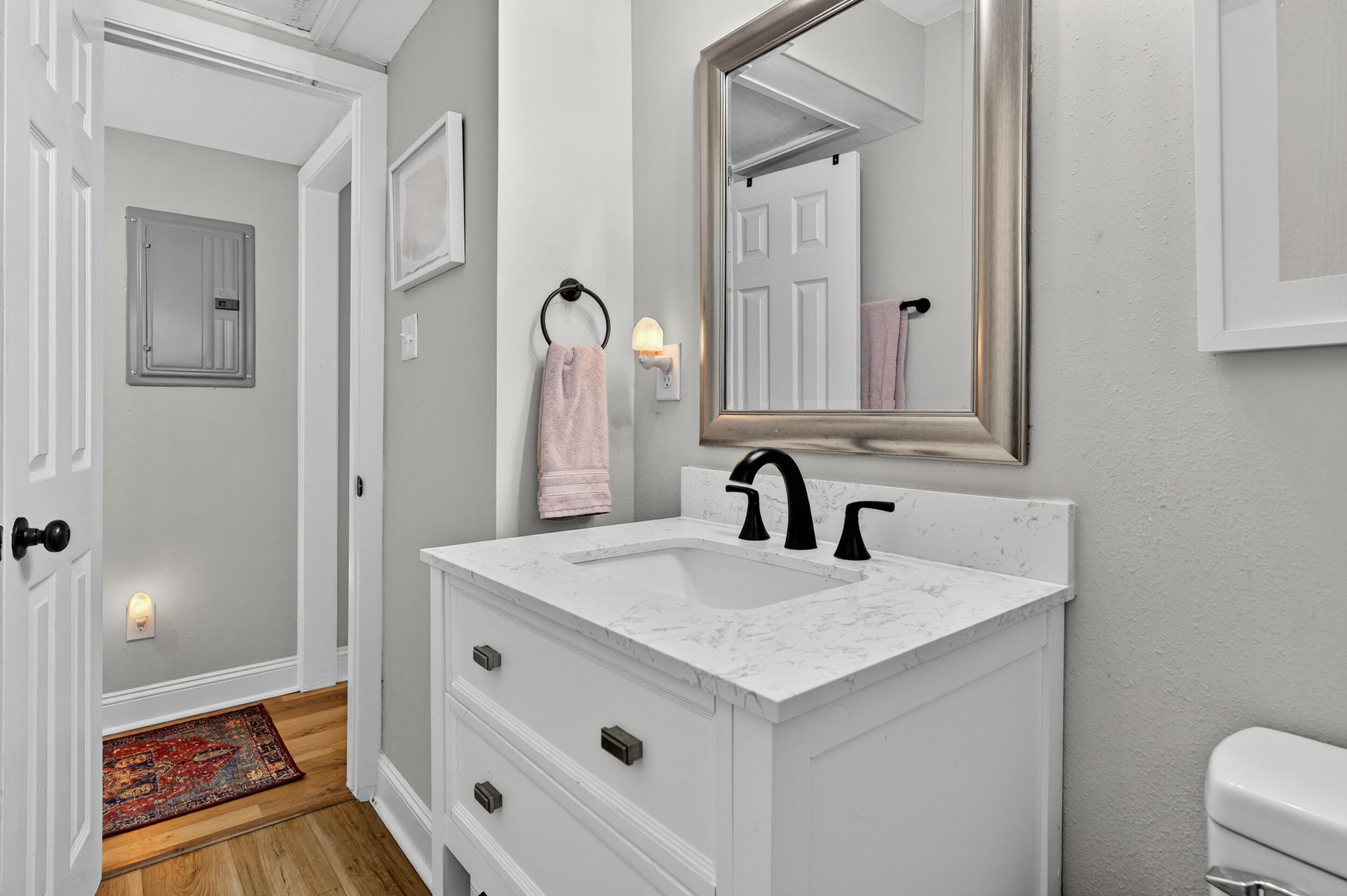 370 Edge Avenue Valparaiso, FL 32580 - Photo 33 of 58 a bathroom with a sink and a mirror