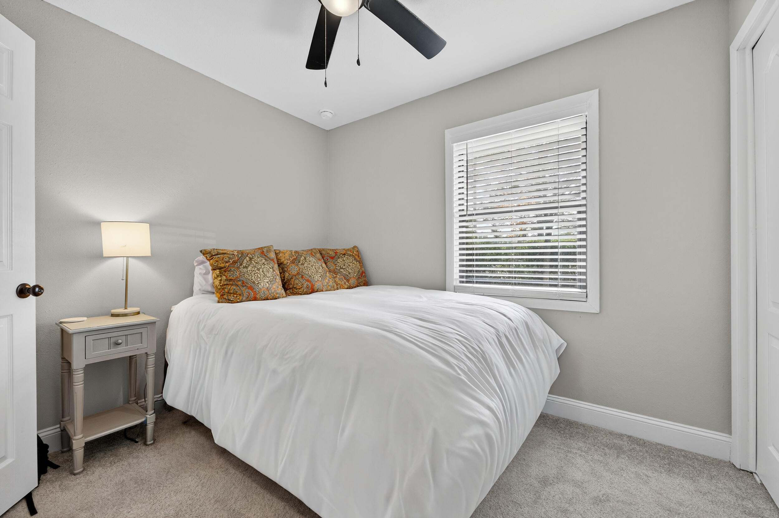 370 Edge Avenue Valparaiso, FL 32580 - Photo 35 of 58 a bedroom with a bed and a window