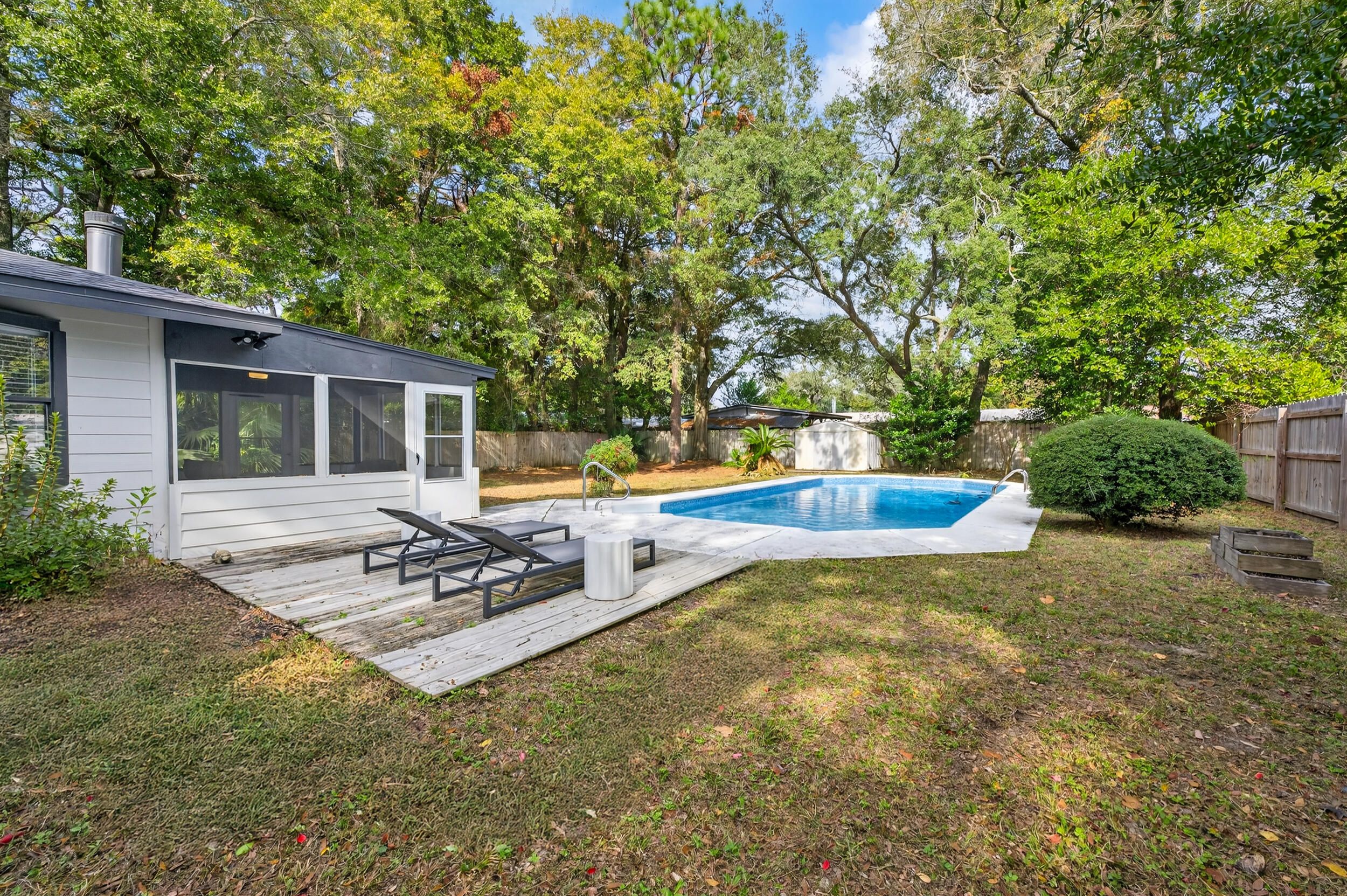 370 Edge Avenue Valparaiso, FL 32580 - Photo 43 of 58 a view of a house with pool and sitting area
