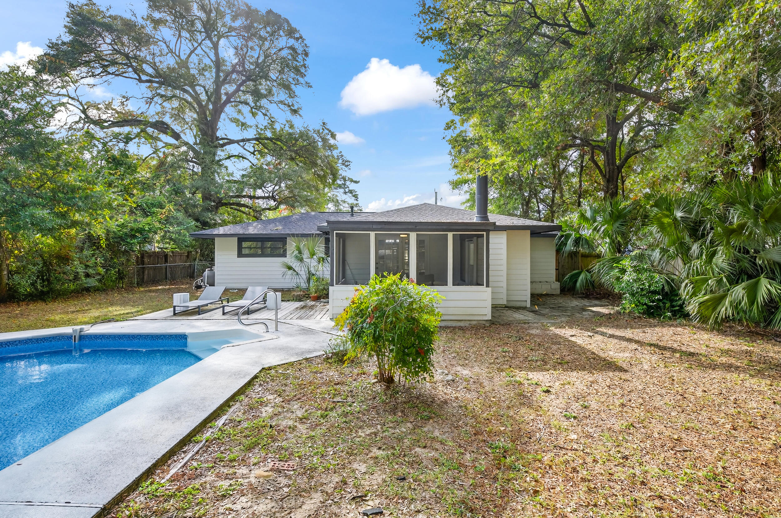 370 Edge Avenue Valparaiso, FL 32580 - Photo 46 of 58 a house view with a seating space and garden