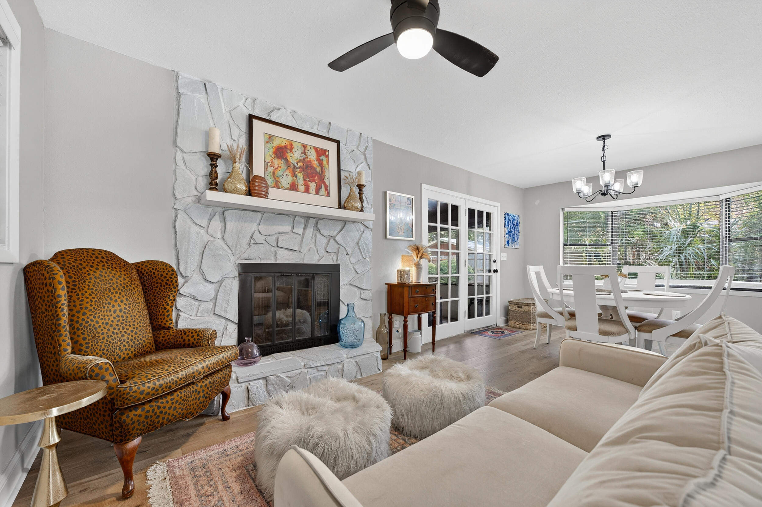 370 Edge Avenue Valparaiso, FL 32580 - Photo 7 of 58 a living room with furniture ceiling fan and a fireplace