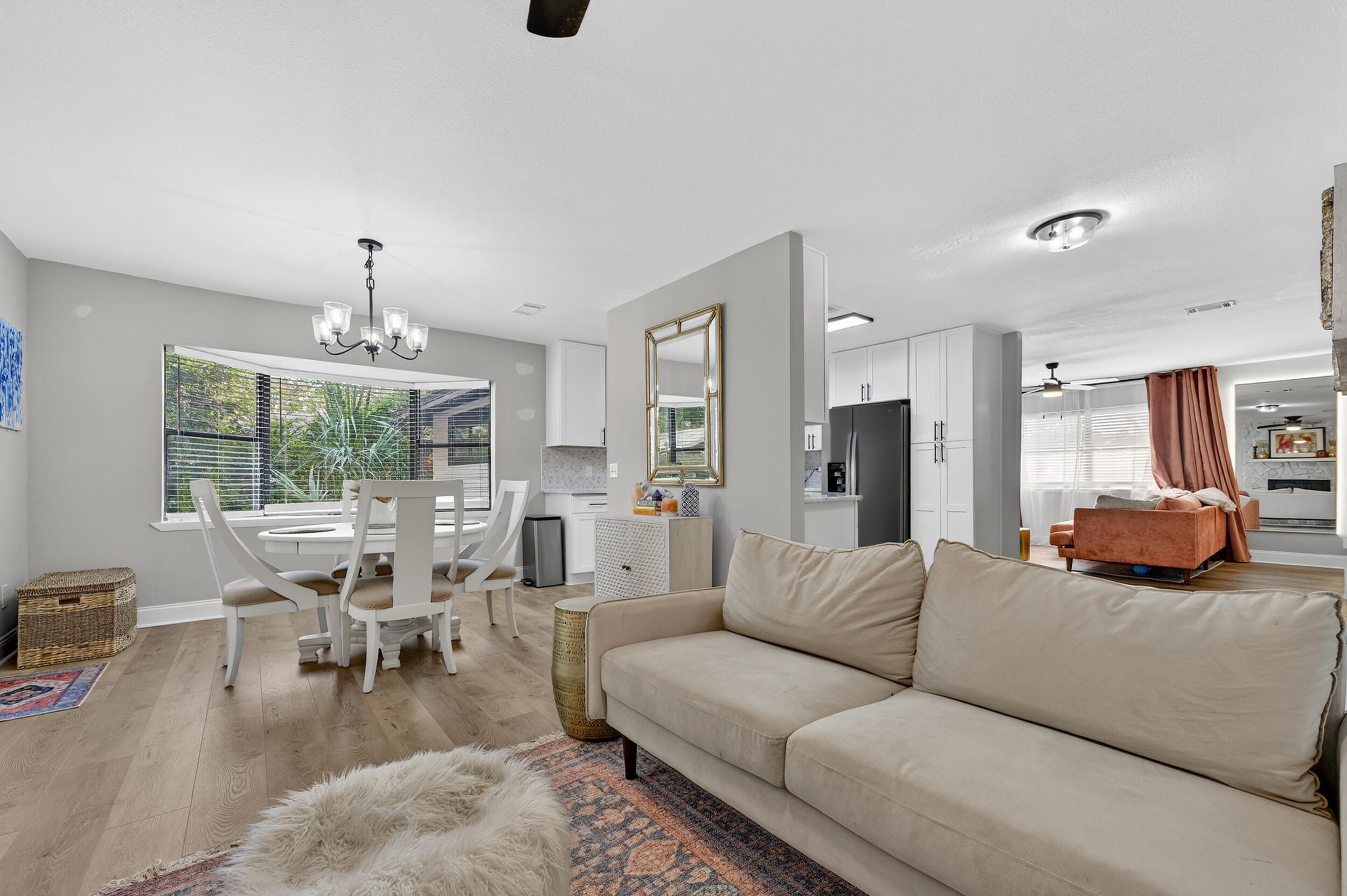 370 Edge Avenue Valparaiso, FL 32580 - Photo 8 of 58 a living room with furniture and a large window