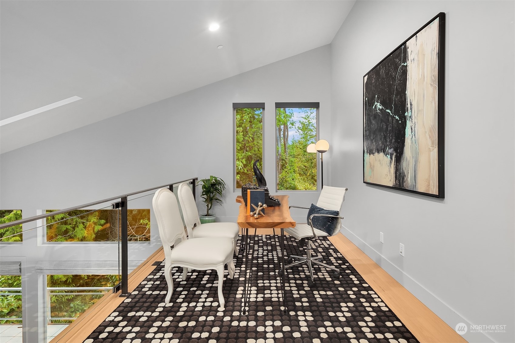 4312 West Cramer Street Seattle, WA 98199 - Photo 18 of 40 a living room with furniture and a rug