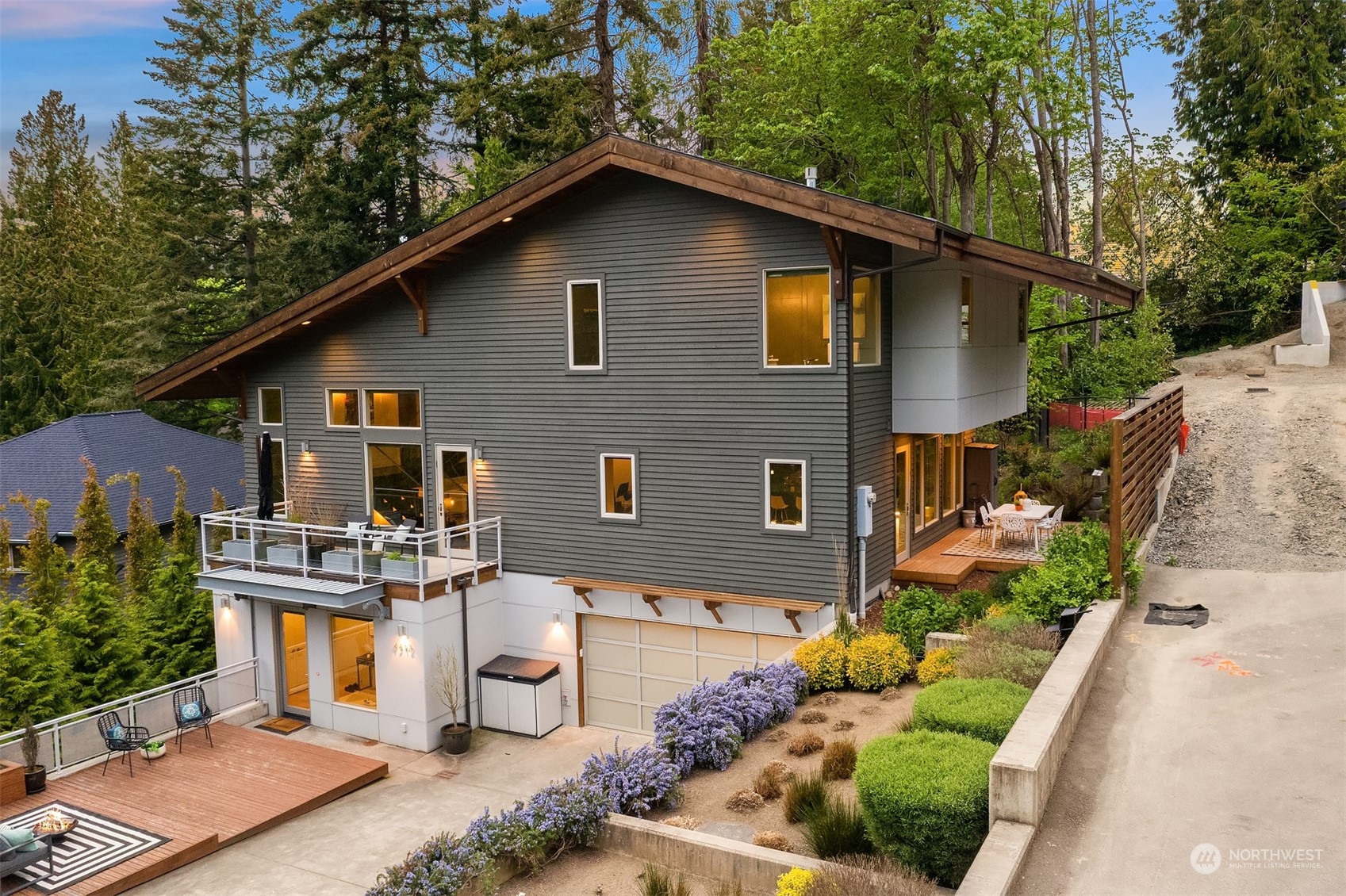 4312 West Cramer Street Seattle, WA 98199 - Photo 2 of 40 a front view of a house with a yard