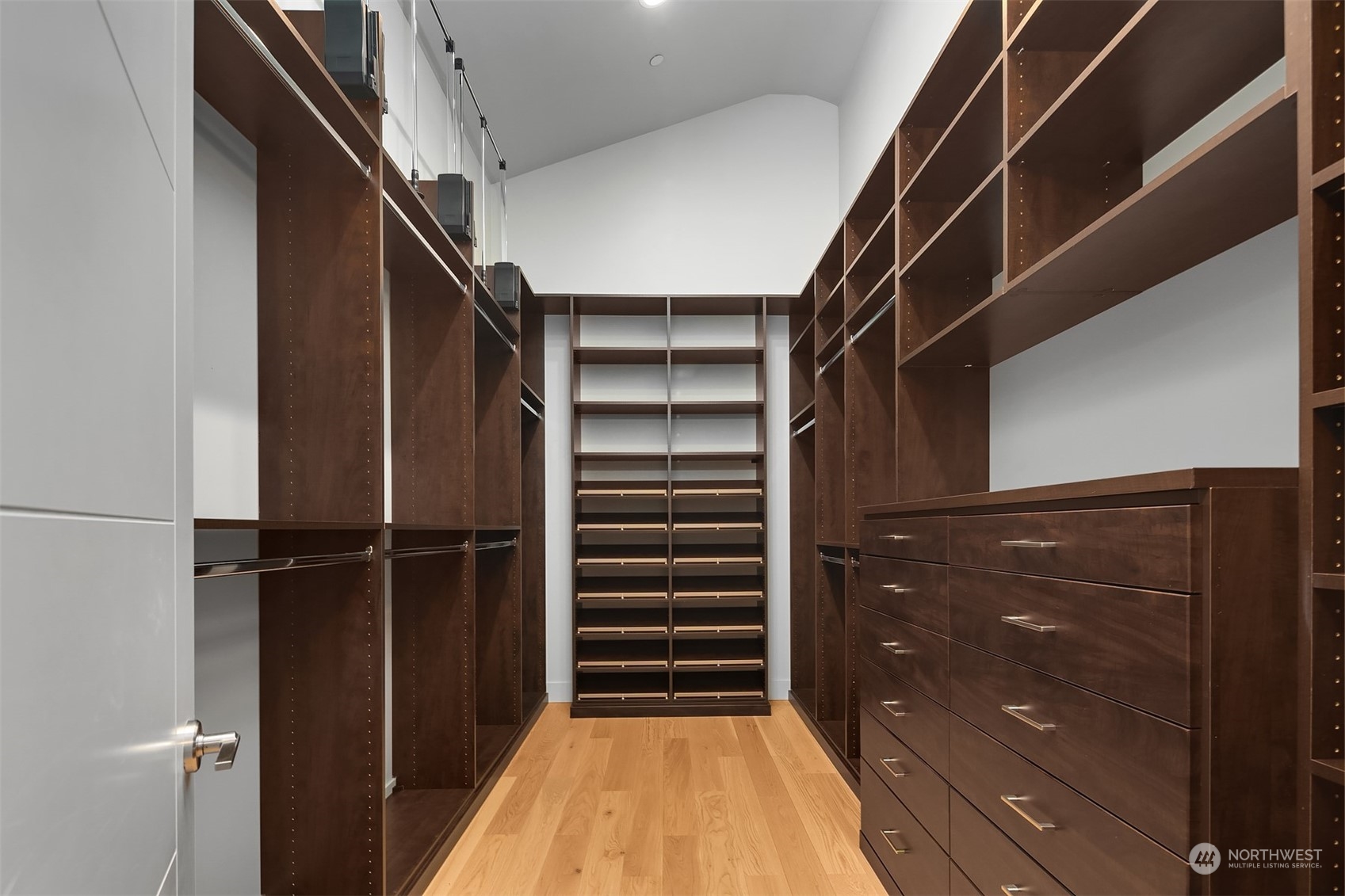 4312 West Cramer Street Seattle, WA 98199 - Photo 22 of 40 a view of walk in closet with empty racks